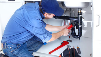 plumbing plumber fixing sink pipe